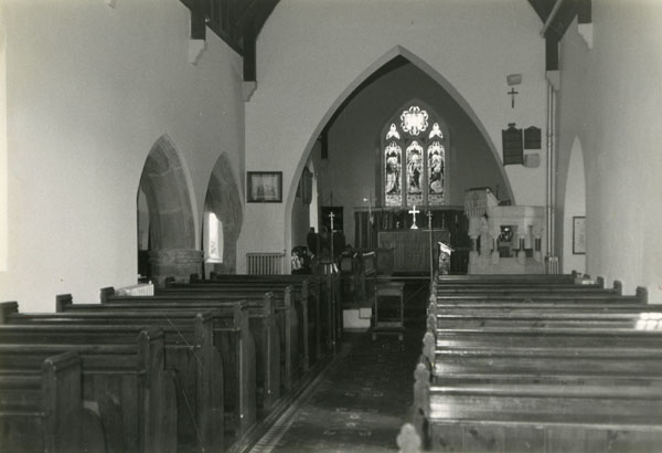 Black and white photograph of the interior of St Jerome�s Church Llangwm detailing the nave and altar